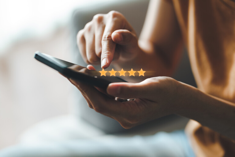 Woman giving five star rating