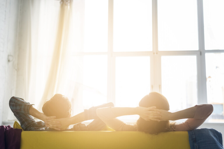 Couple looking through window