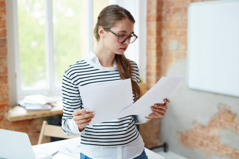 Woman reading papers