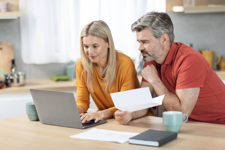 Couple at table at home