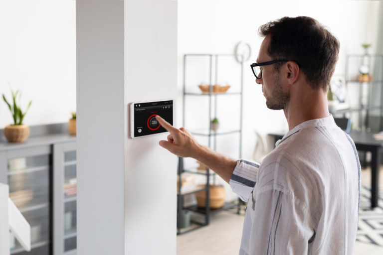 Man using thermostat