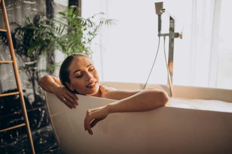 Woman relaxing in bath